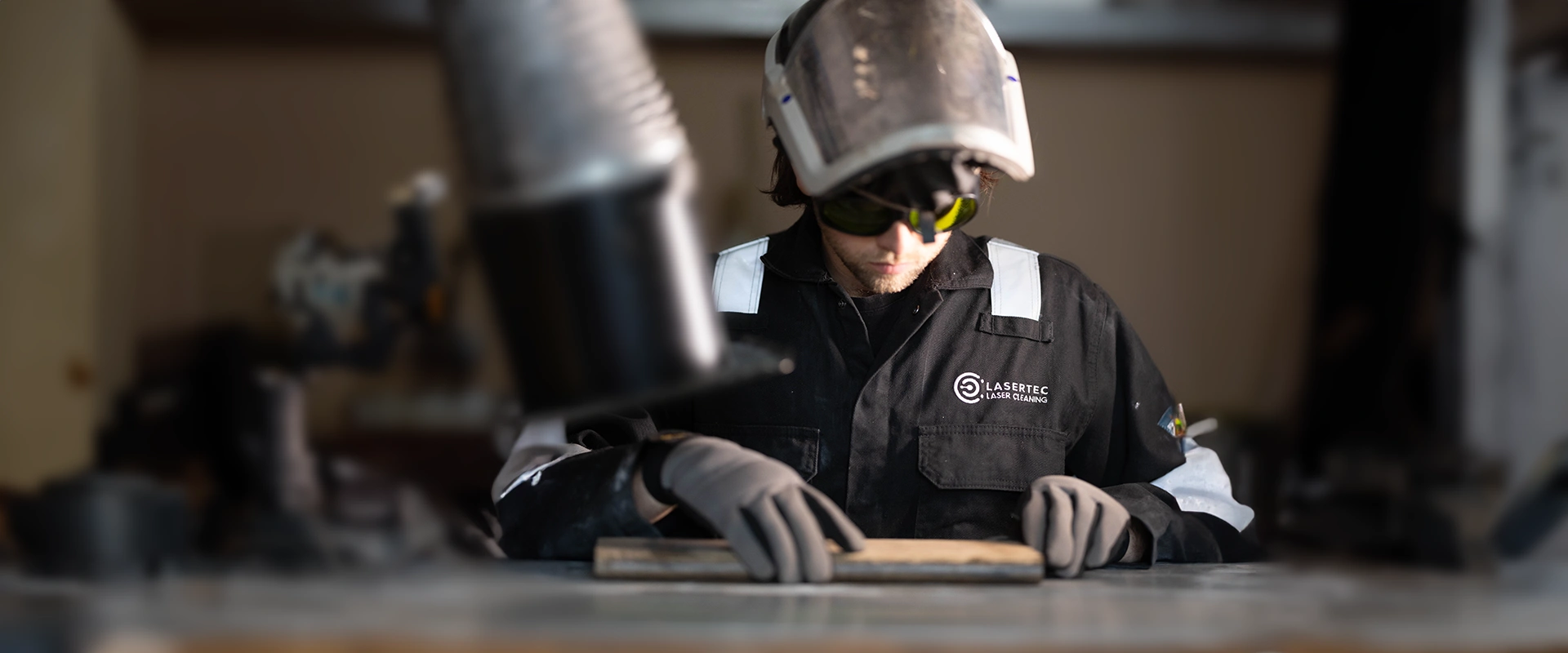LaserTec team member preparing to clean with a laser