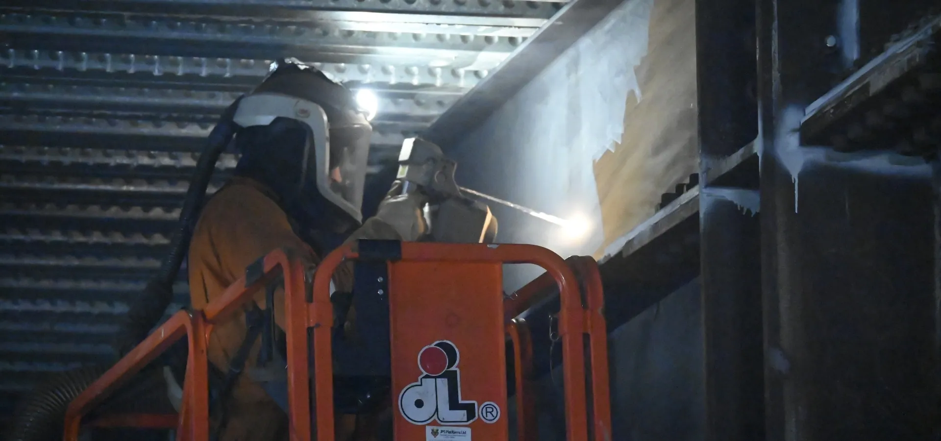 Laser cleaning in action removing rust from structural steel